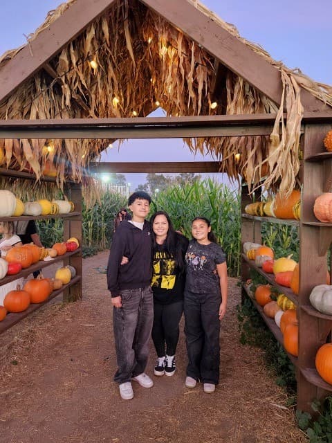 Jessica Evans and her kids at a pumpkin patch